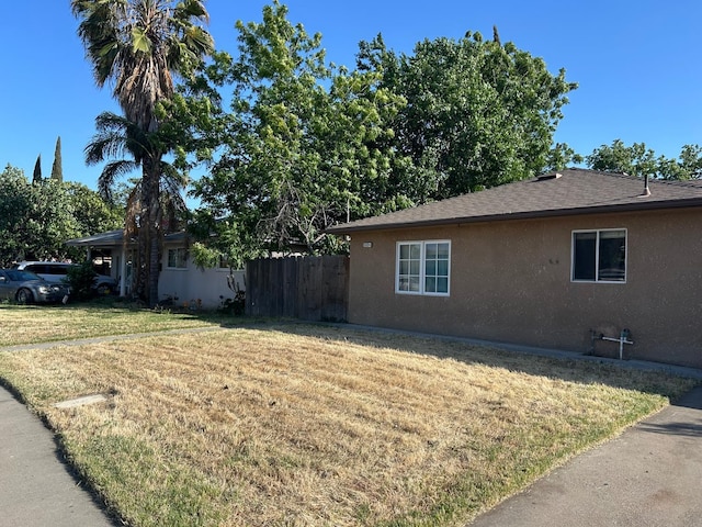 3204 E E Ter, Fresno, CA 93703 - view of property exterior with stucco siding