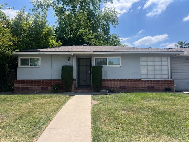 single story home featuring a front lawn, brick siding, and crawl space