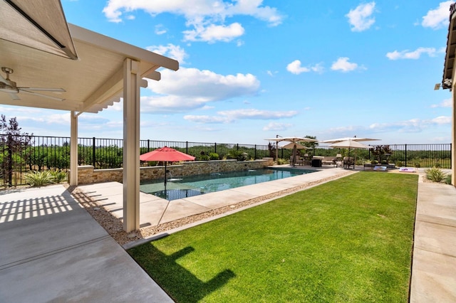 view of pool with a patio area and a ceiling fan