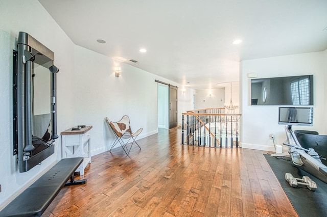 interior space featuring visible vents, recessed lighting, light wood finished floors, an inviting chandelier, and baseboards