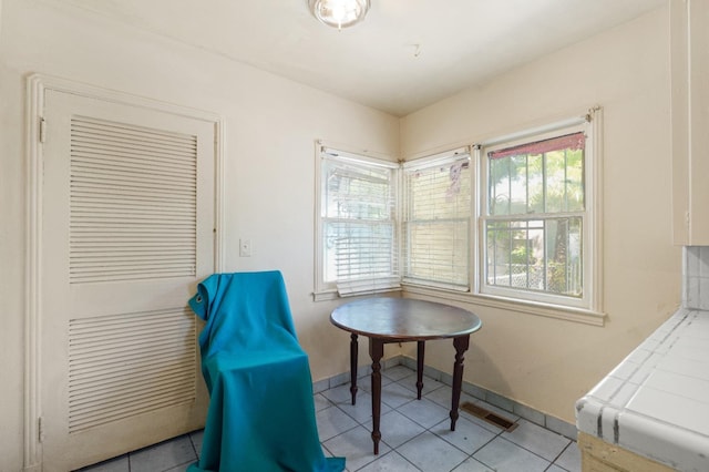4241 E Butler Ave, Fresno, CA 93702 - living area featuring light tile patterned floors and baseboards