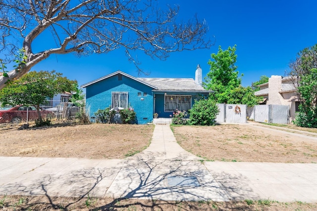 4241 E Butler Ave, Fresno, CA 93702 - view of front of home featuring a chimney