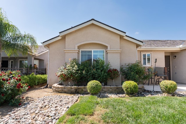 13375 Peach St, Parlier, CA 93648 - view of front facade with stucco siding and roof with shingles