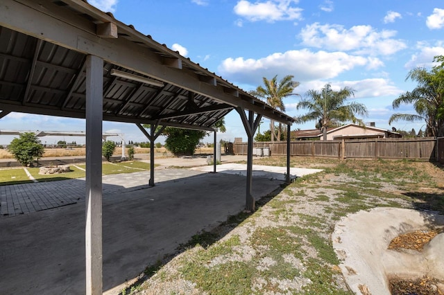 view of yard featuring a patio and fence
