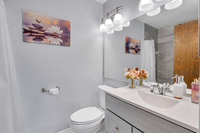 full bathroom featuring toilet, vanity, and curtained shower