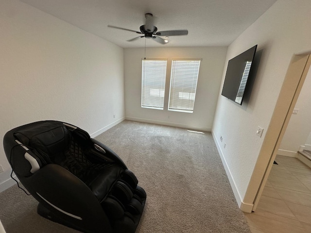 unfurnished room with baseboards and ceiling fan