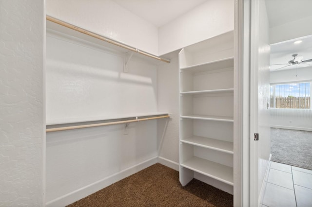 5091 N San Clemente Ave, Fresno, CA 93723 - walk in closet featuring carpet and ceiling fan