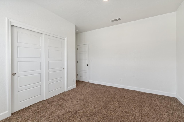 5091 N San Clemente Ave, Fresno, CA 93723 - unfurnished bedroom with carpet floors, a closet, and baseboards