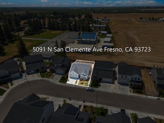 5091 N San Clemente Ave, Fresno, CA 93723 - aerial perspective of suburban area with property boundaries highlighted