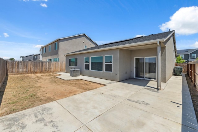 5091 N San Clemente Ave, Fresno, CA 93723 - back of property featuring stucco siding, a fenced backyard, and a patio area