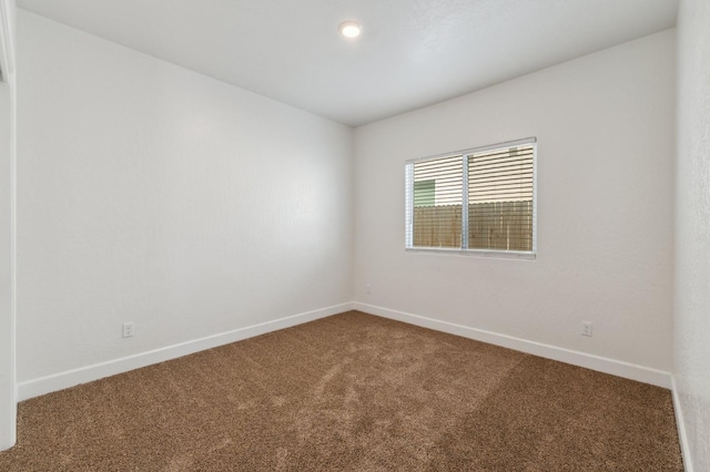 5091 N San Clemente Ave, Fresno, CA 93723 - unfurnished room featuring carpet and baseboards