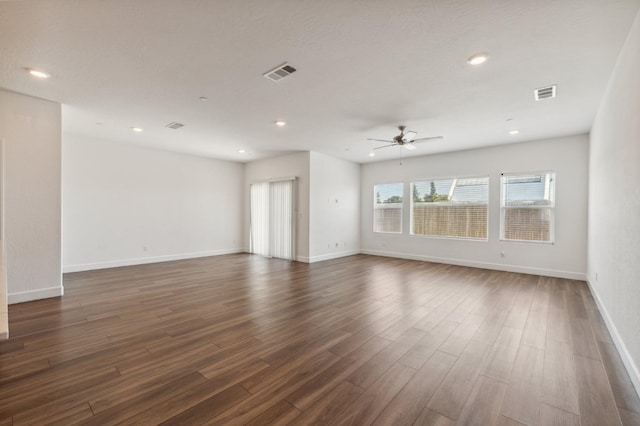 5091 N San Clemente Ave, Fresno, CA 93723 - unfurnished room with ceiling fan, dark wood-style floors, recessed lighting, and baseboards