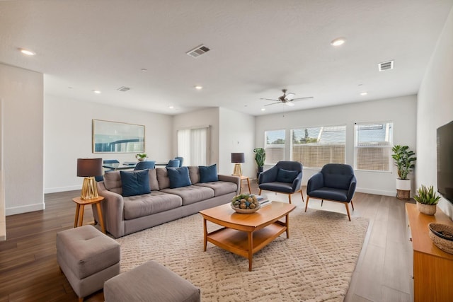 5091 N San Clemente Ave, Fresno, CA 93723 - living area with recessed lighting, wood finished floors, ceiling fan, and baseboards