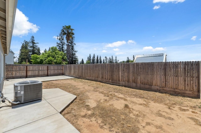 5091 N San Clemente Ave, Fresno, CA 93723 - fenced backyard with cooling unit and a patio area