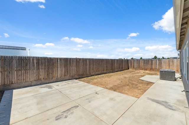 5091 N San Clemente Ave, Fresno, CA 93723 - fenced backyard featuring central AC unit and a patio area