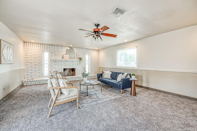 4693 E Church Ave, Fresno, CA 93725 - living area featuring carpet floors, a ceiling fan, a fireplace, and recessed lighting