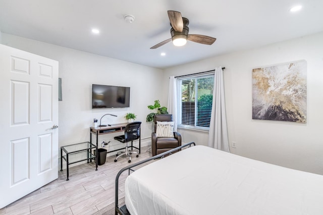 bedroom with light wood-style floors, recessed lighting, and a ceiling fan