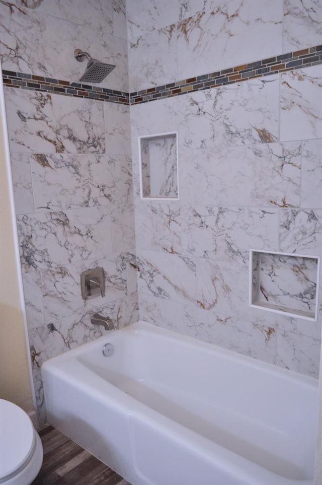 43777 Kaweah River Dr, Three Rivers, CA 93271 - bathroom featuring wood finished floors, bathing tub / shower combination, and toilet