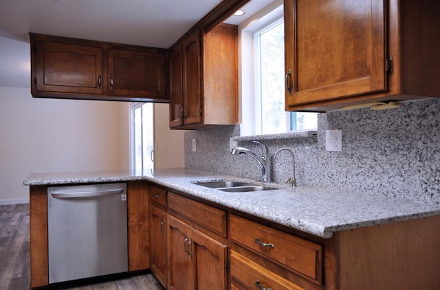 43777 Kaweah River Dr, Three Rivers, CA 93271 - kitchen featuring stainless steel dishwasher, a sink, light wood finished floors, decorative backsplash, and a peninsula