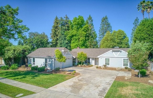 6619 N Valentine Ave, Fresno, CA 93711 - single story home featuring concrete driveway, a front yard, an attached garage, and a chimney
