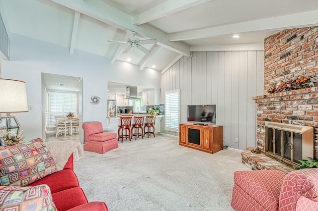 6619 N Valentine Ave, Fresno, CA 93711 - living room with plenty of natural light, a ceiling fan, light carpet, and a brick fireplace