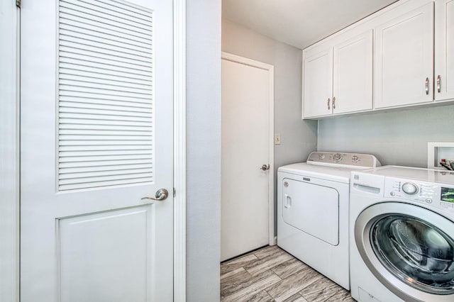 6619 N Valentine Ave, Fresno, CA 93711 - washroom featuring washing machine and dryer and cabinet space
