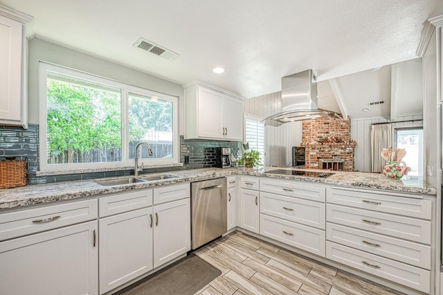 6619 N Valentine Ave, Fresno, CA 93711 - kitchen featuring dishwasher, island exhaust hood, backsplash, white cabinetry, and beam ceiling