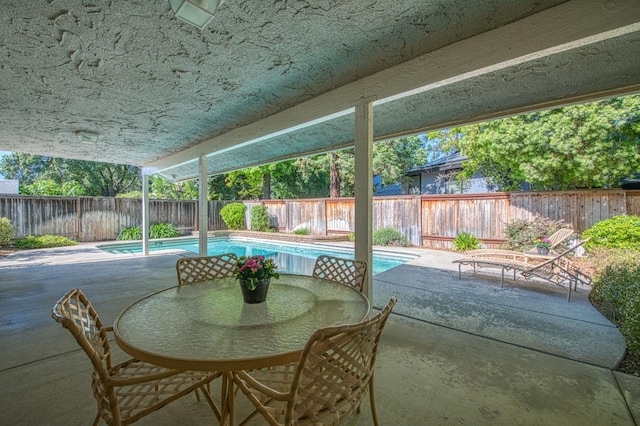 6619 N Valentine Ave, Fresno, CA 93711 - view of pool with a patio, a fenced backyard, and outdoor dining space