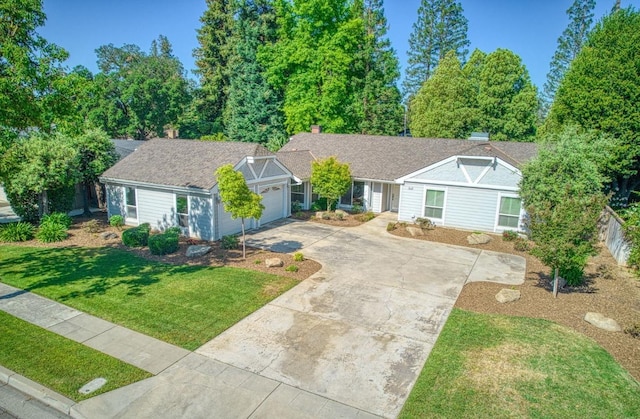 6619 N Valentine Ave, Fresno, CA 93711 - ranch-style home with driveway, a garage, and a front yard