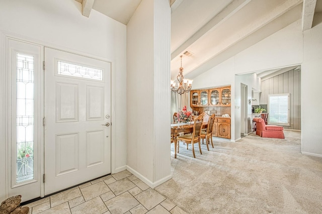 6619 N Valentine Ave, Fresno, CA 93711 - entryway with beamed ceiling, a chandelier, and high vaulted ceiling