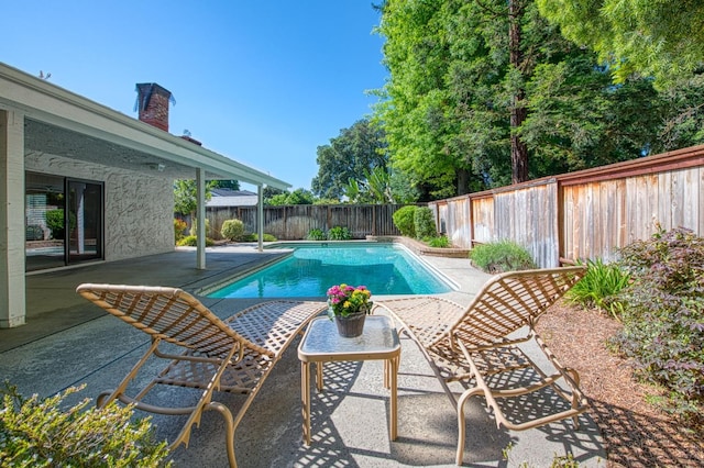 6619 N Valentine Ave, Fresno, CA 93711 - view of swimming pool featuring a patio and a fenced backyard