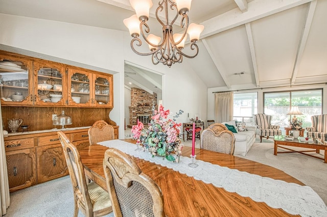 6619 N Valentine Ave, Fresno, CA 93711 - dining room featuring light colored carpet and a chandelier