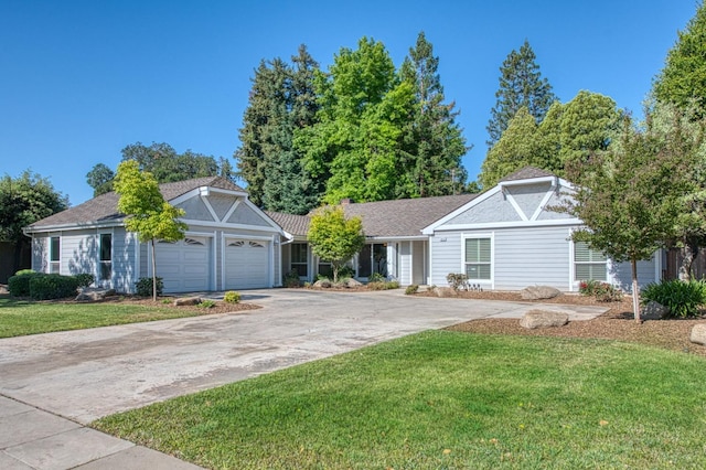 6619 N Valentine Ave, Fresno, CA 93711 - single story home featuring driveway, a front lawn, and an attached garage
