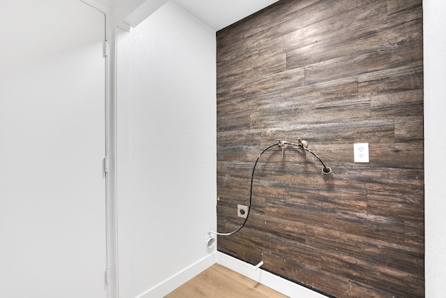 424 W Menlo Ave, Clovis, CA 93612 - laundry room with baseboards and wood finished floors
