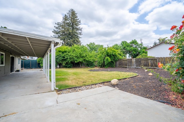 424 W Menlo Ave, Clovis, CA 93612 - view of yard featuring a patio, a carport, and driveway