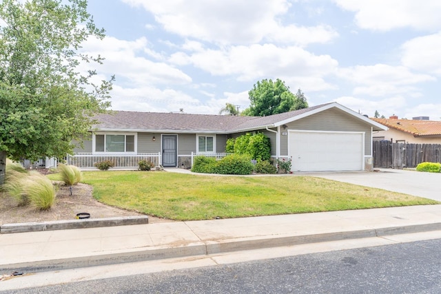 424 W Menlo Ave, Clovis, CA 93612 - ranch-style house featuring an attached garage, concrete driveway, a porch, and a shingled roof