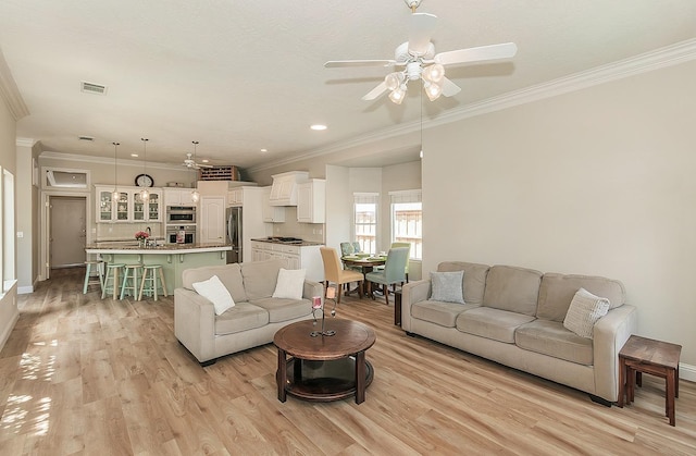 287 W Trenton Ave, Clovis, CA 93619 - living area with crown molding, a ceiling fan, light wood-style flooring, baseboards, and recessed lighting