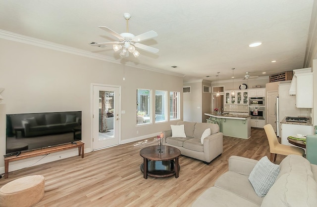 287 W Trenton Ave, Clovis, CA 93619 - living room featuring ceiling fan, light wood-style flooring, crown molding, recessed lighting, and baseboards