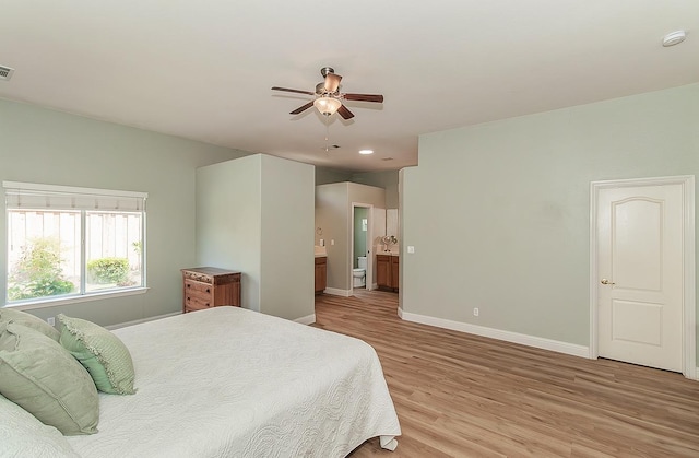 287 W Trenton Ave, Clovis, CA 93619 - bedroom featuring light wood-style floors, baseboards, ensuite bath, ceiling fan, and recessed lighting