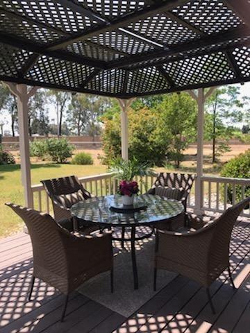 13801 E Rialto Ave, Sanger, CA 93657 - wooden terrace with outdoor dining space