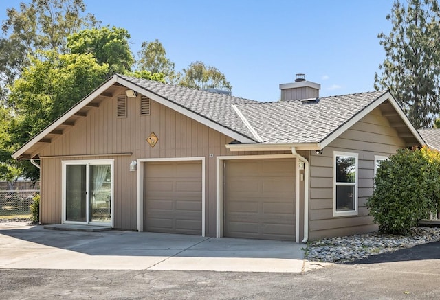 13801 E Rialto Ave, Sanger, CA 93657 - garage featuring fence and concrete driveway