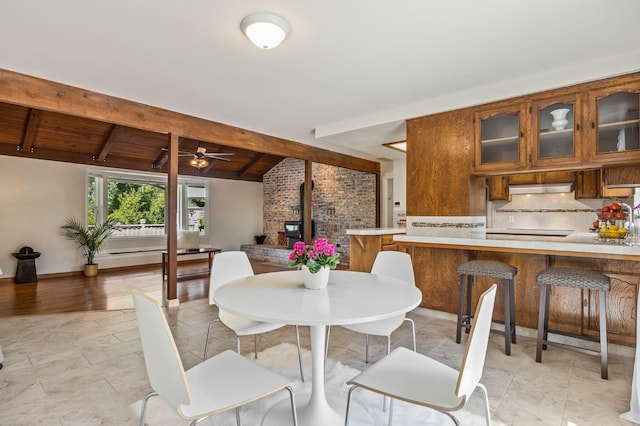 13801 E Rialto Ave, Sanger, CA 93657 - dining room featuring ceiling fan, baseboards, and wood ceiling