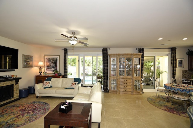 3476 Trenton Ln, Clovis, CA 93619 - living room featuring light tile patterned floors, healthy amount of natural light, recessed lighting, ceiling fan, and a fireplace