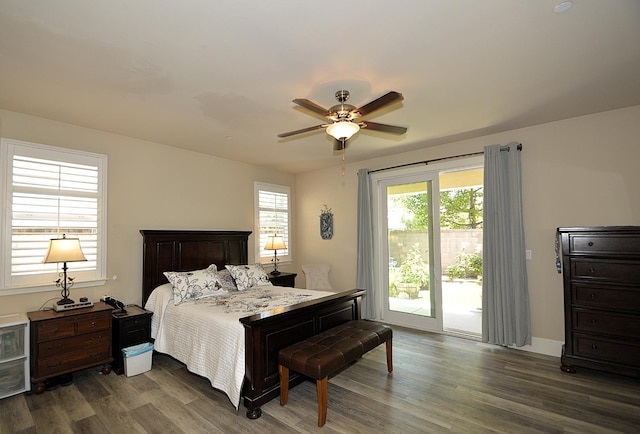 bedroom with access to exterior, wood finished floors, and a ceiling fan