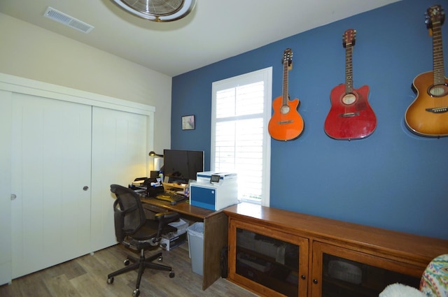 office area with wood finished floors
