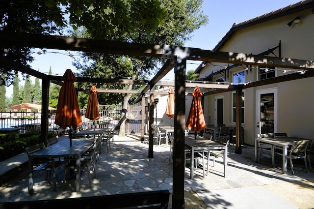 3476 Trenton Ln, Clovis, CA 93619 - view of patio with outdoor dining space and fence