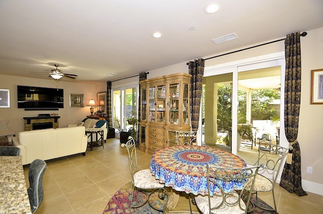 3476 Trenton Ln, Clovis, CA 93619 - dining space featuring light tile patterned floors, recessed lighting, ceiling fan, and baseboards