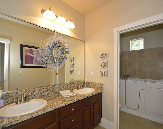 full bathroom with tile patterned floors, a bath, double vanity, and toilet