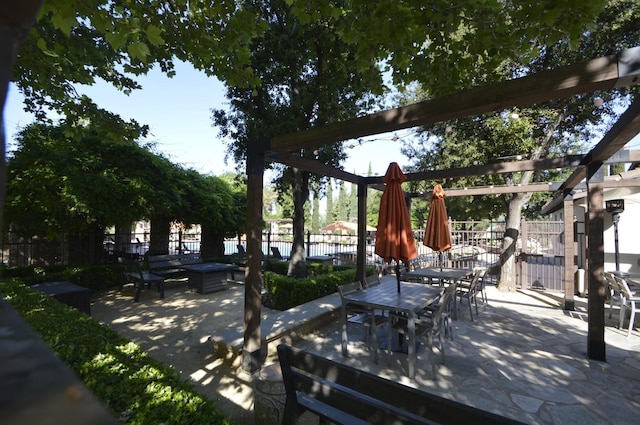 3476 Trenton Ln, Clovis, CA 93619 - surrounding community featuring fence, outdoor dining area, and a patio area