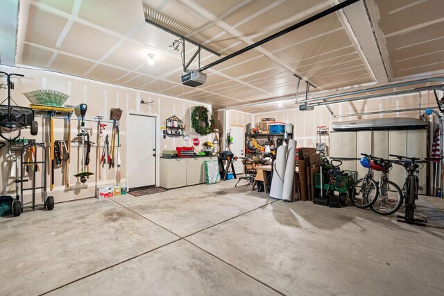 garage featuring a garage door opener